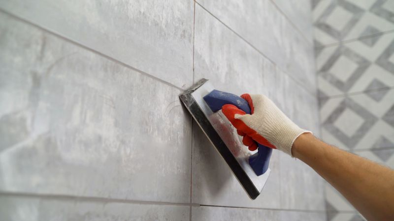 Grouting and sealing tiles